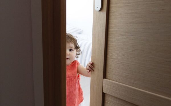 baby behind door 1 - Mandatory Credit: Photo by Mint Images/REX/Shutterstock (8969944a)