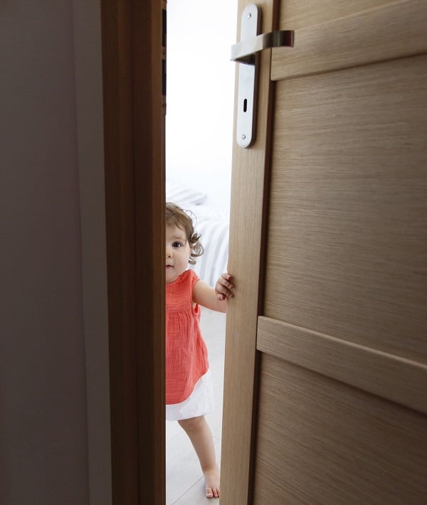 baby behind door 1 - Mandatory Credit: Photo by Mint Images/REX/Shutterstock (8969944a)