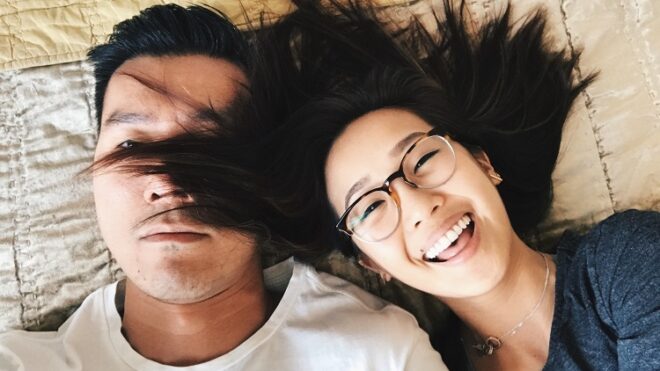 fun-couple-selfie-bed