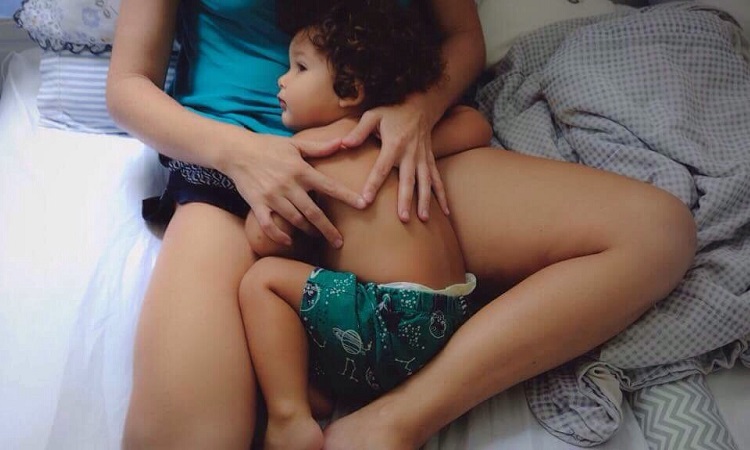 child-sick-mom-bed