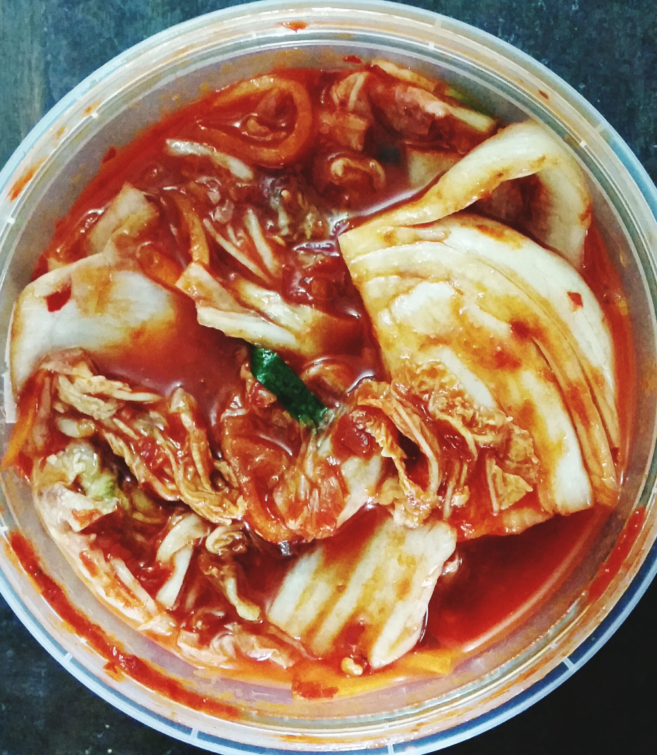 238178-overhead-view-of-kimchi-in-a-container_t20_g817l8.jpg