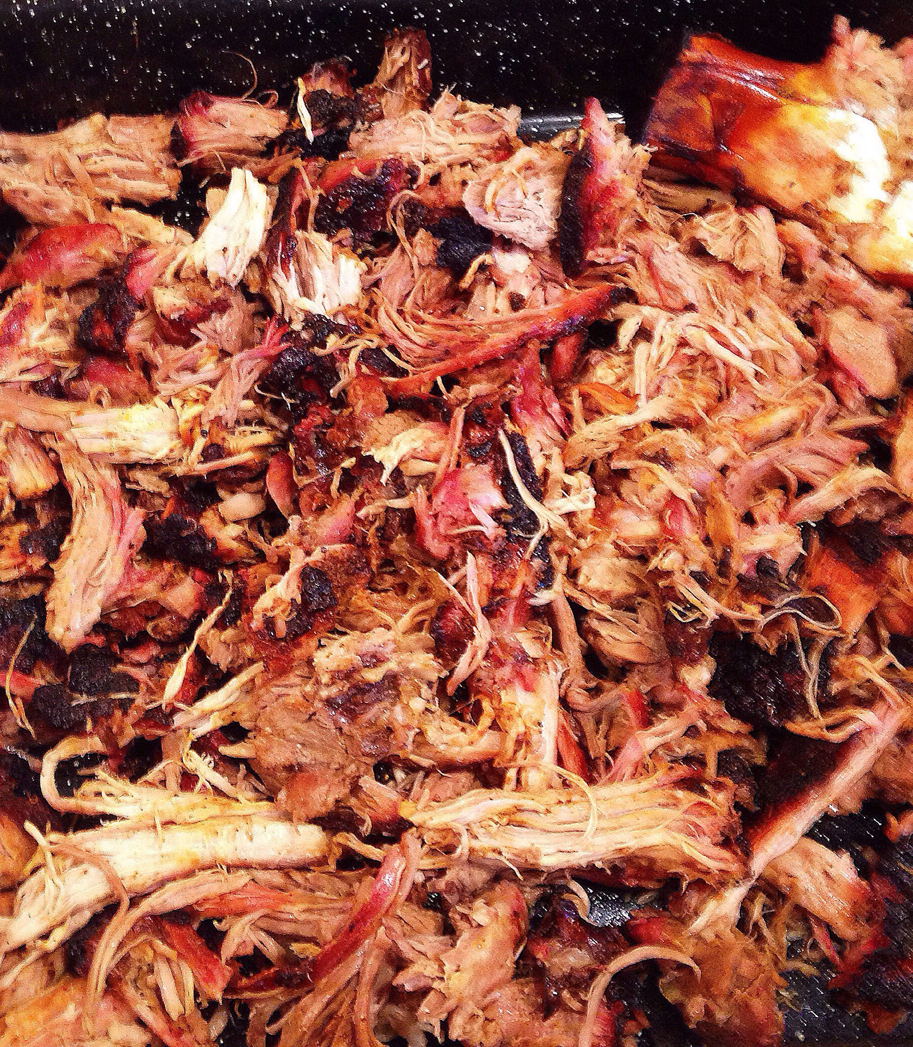 238182-pork-shoulder-slow-smoked-with-chunks-of-applewood-for-6.jpg