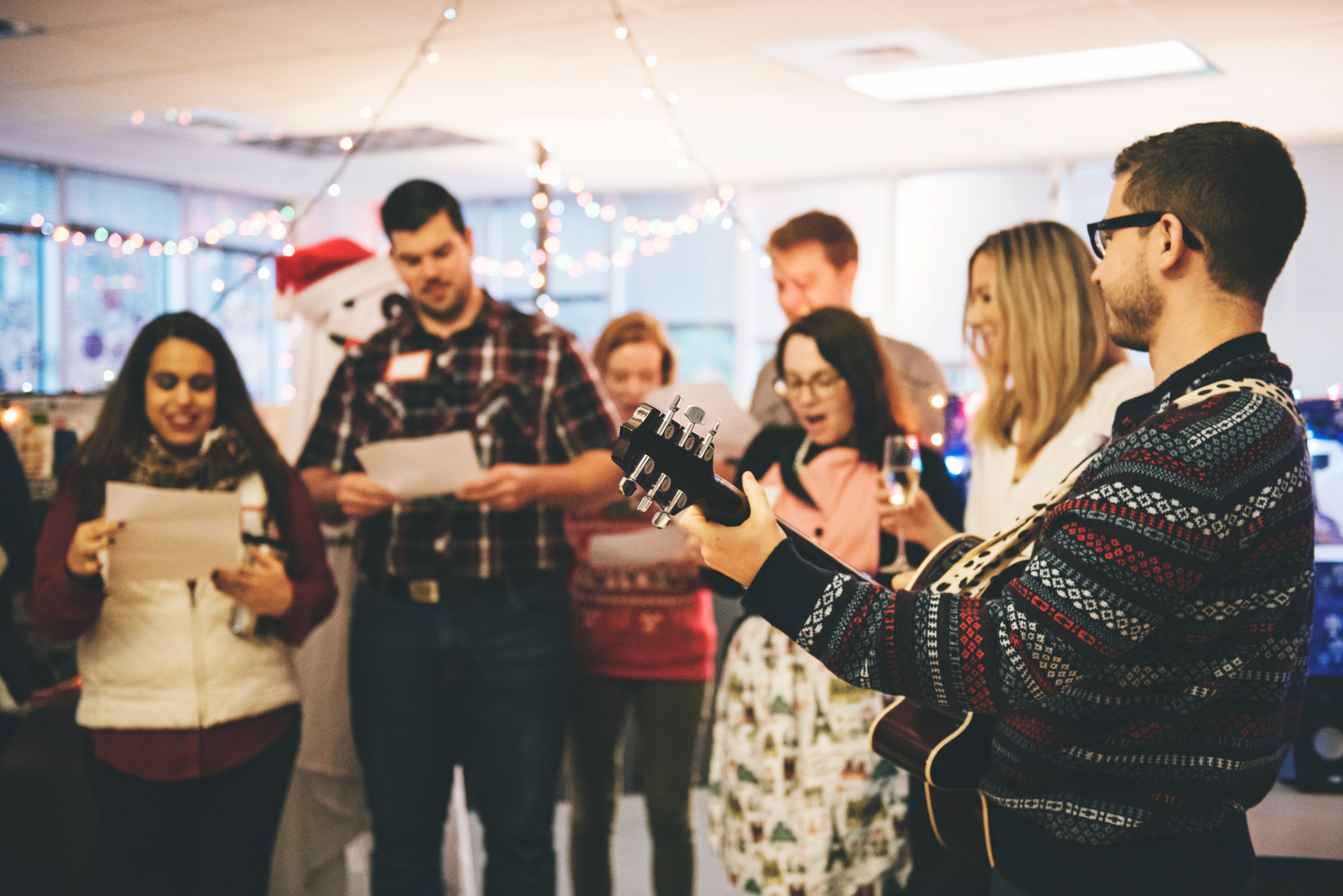 238797-coworkers-singing-christmas-carols.jpg