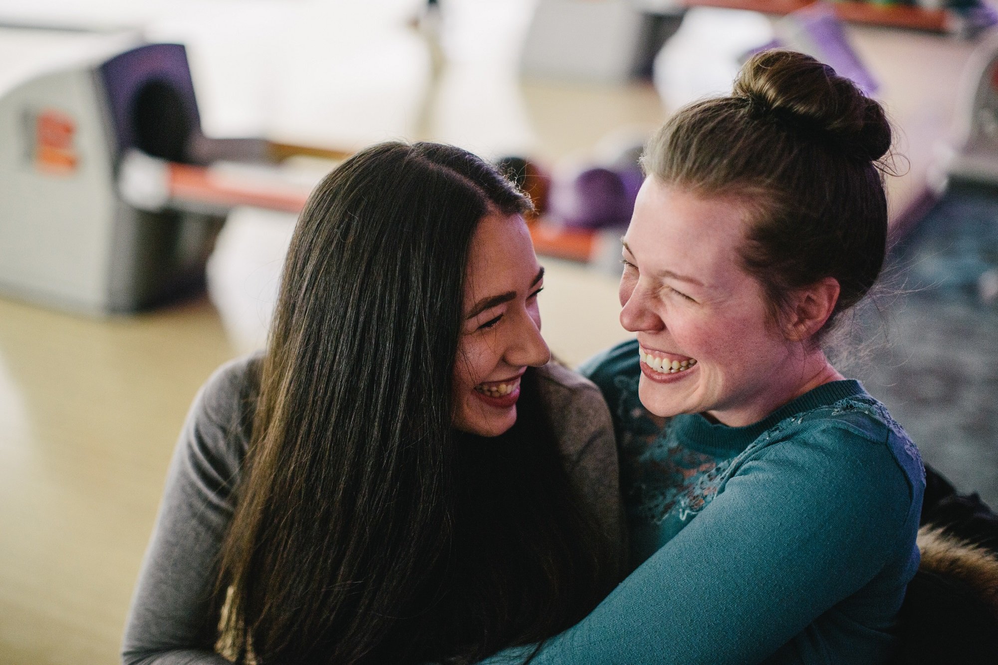 240645-women-laughing-hugging.jpg