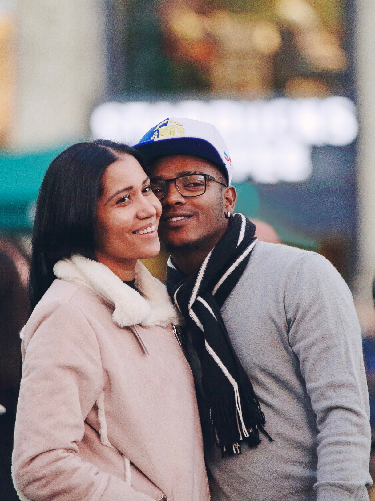 240648-couple-smiling-camera-winter.jpg