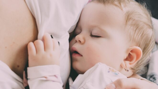 toddler-sleeping-in-moms-arms-adorable-sleeping-child_t20_kr3r2k
