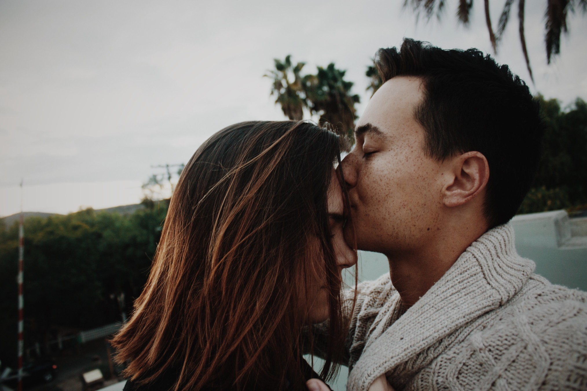 240802-couple-kissing-forehead.jpg
