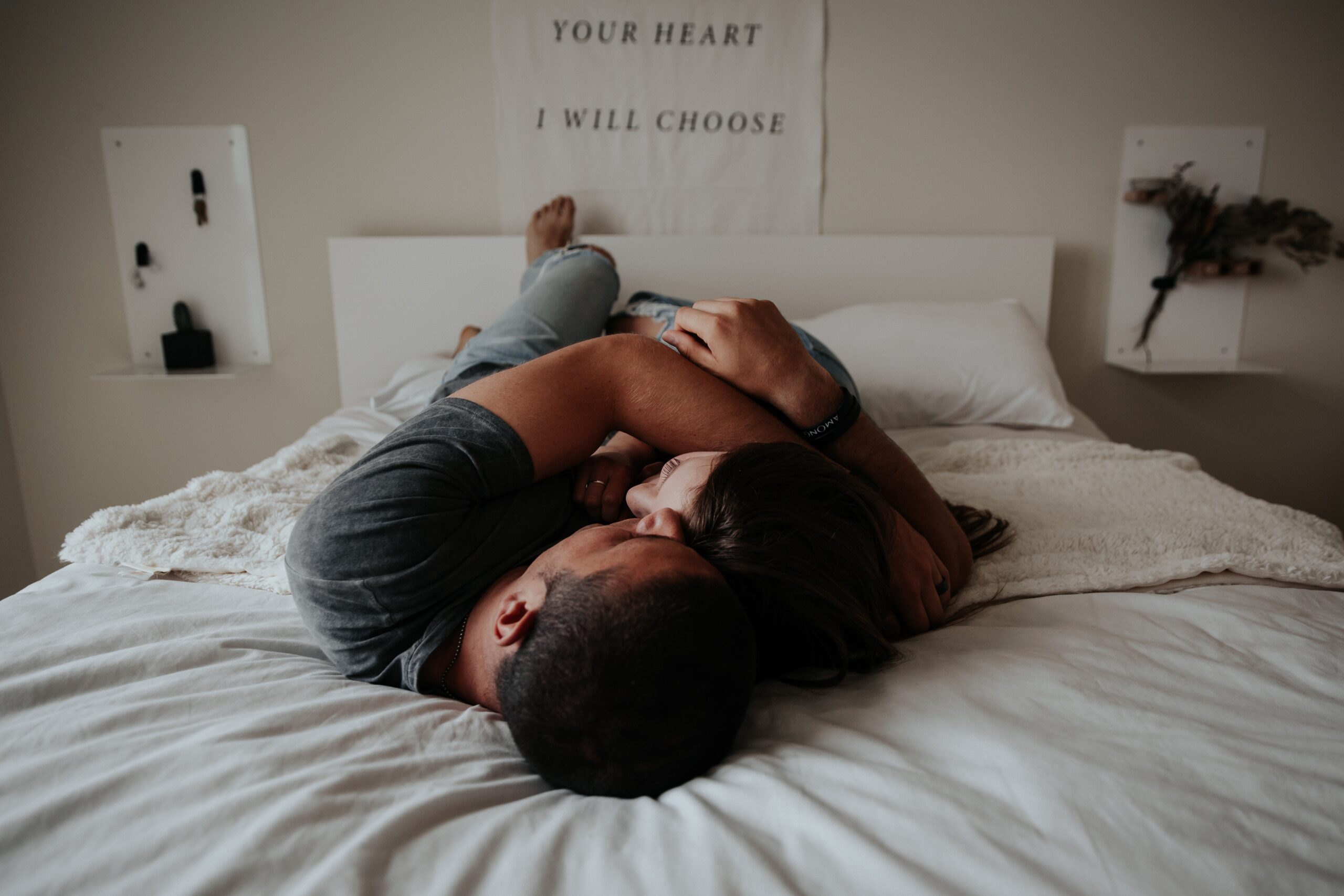240825-couple-cuddling-bed.jpg