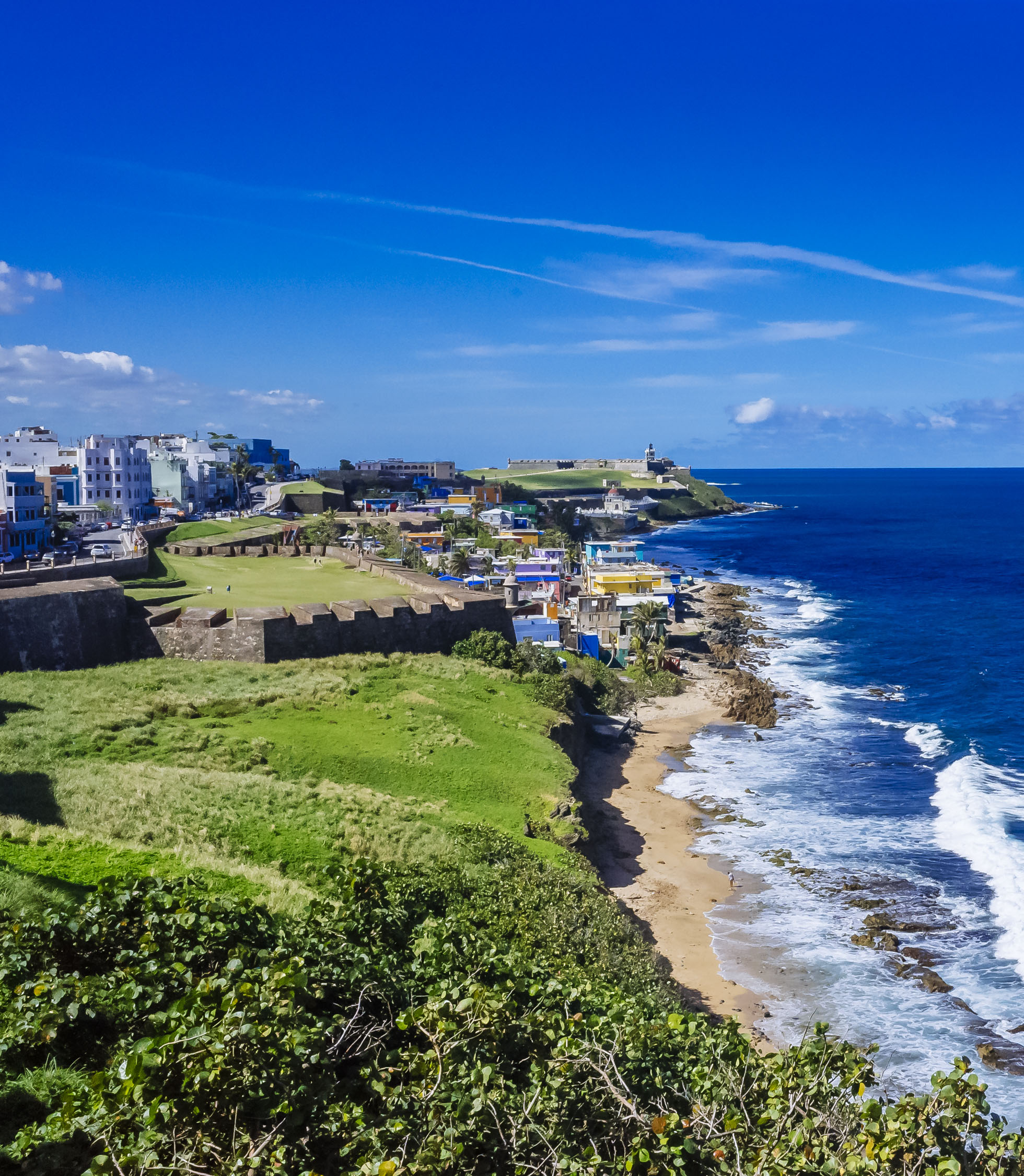 Coastline of Puerto Rico with Houses of Old San Juan - Panoramic View of the Coastline of Puerto Rico with Houses of Old San Juan and the Caribbean Sea
