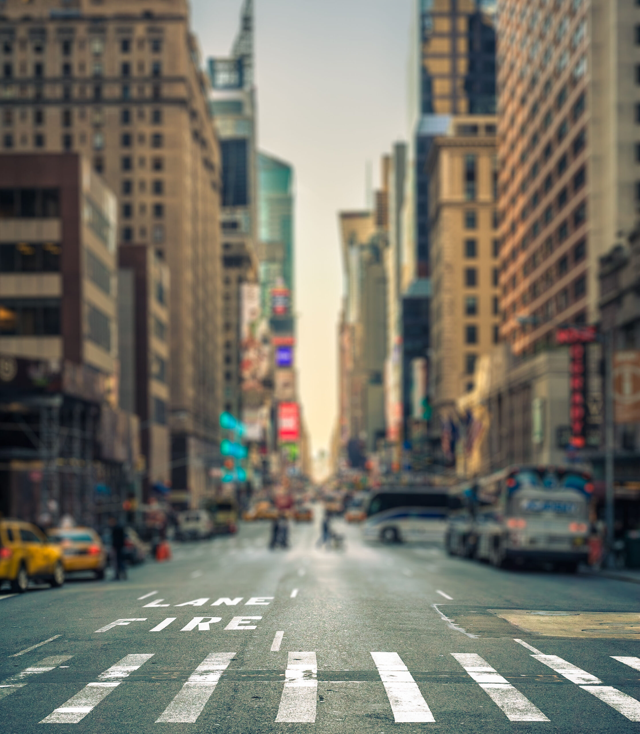 Tilt-shift view of a crosswalk in a New-York city avenue