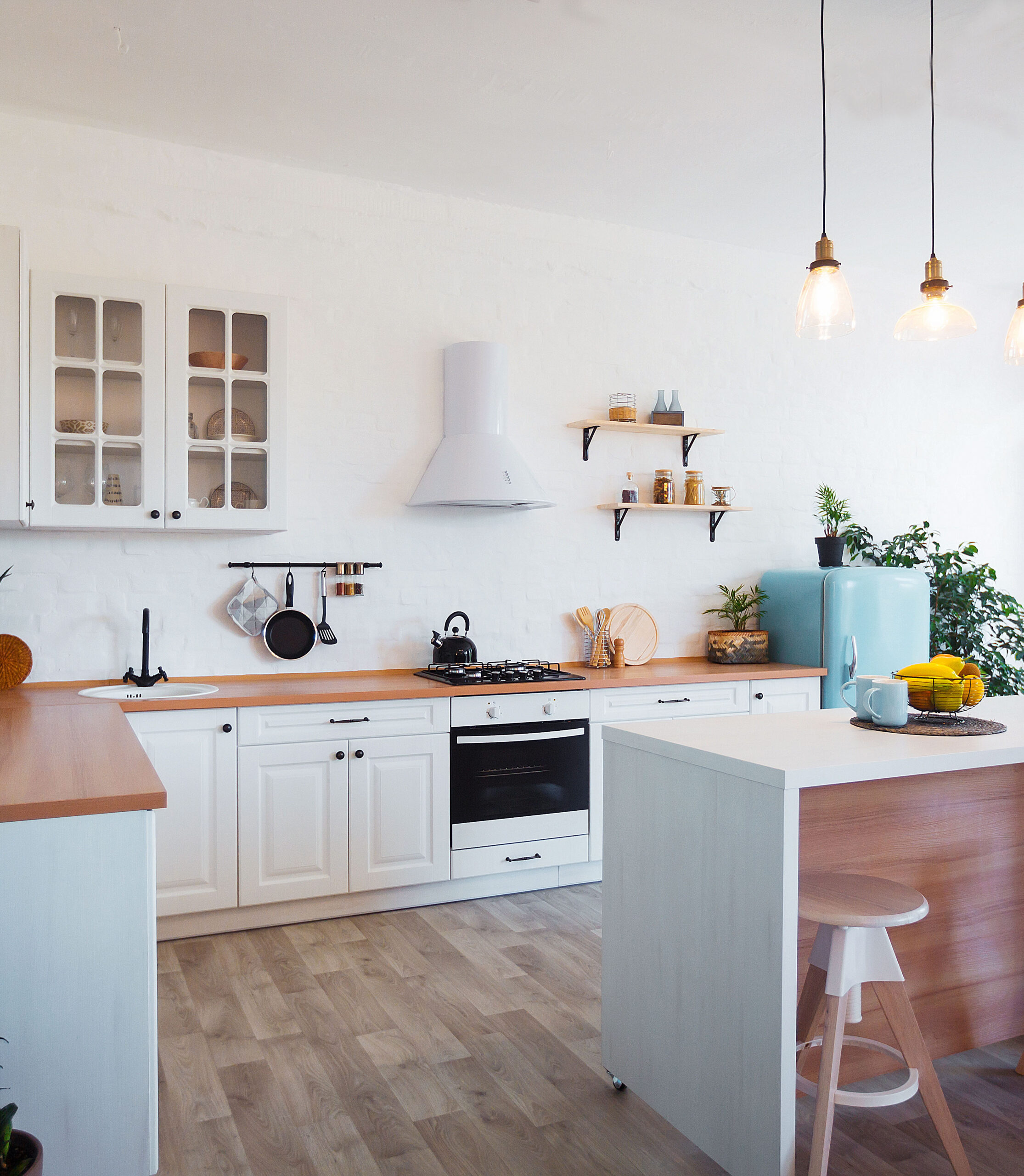 Modern Kitchen Interior with Island, Sink, Cabinets, and Big Window in New Luxury Home.