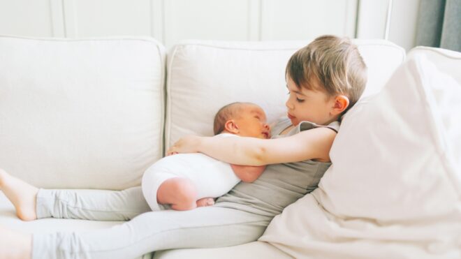 big-brother-holding-baby