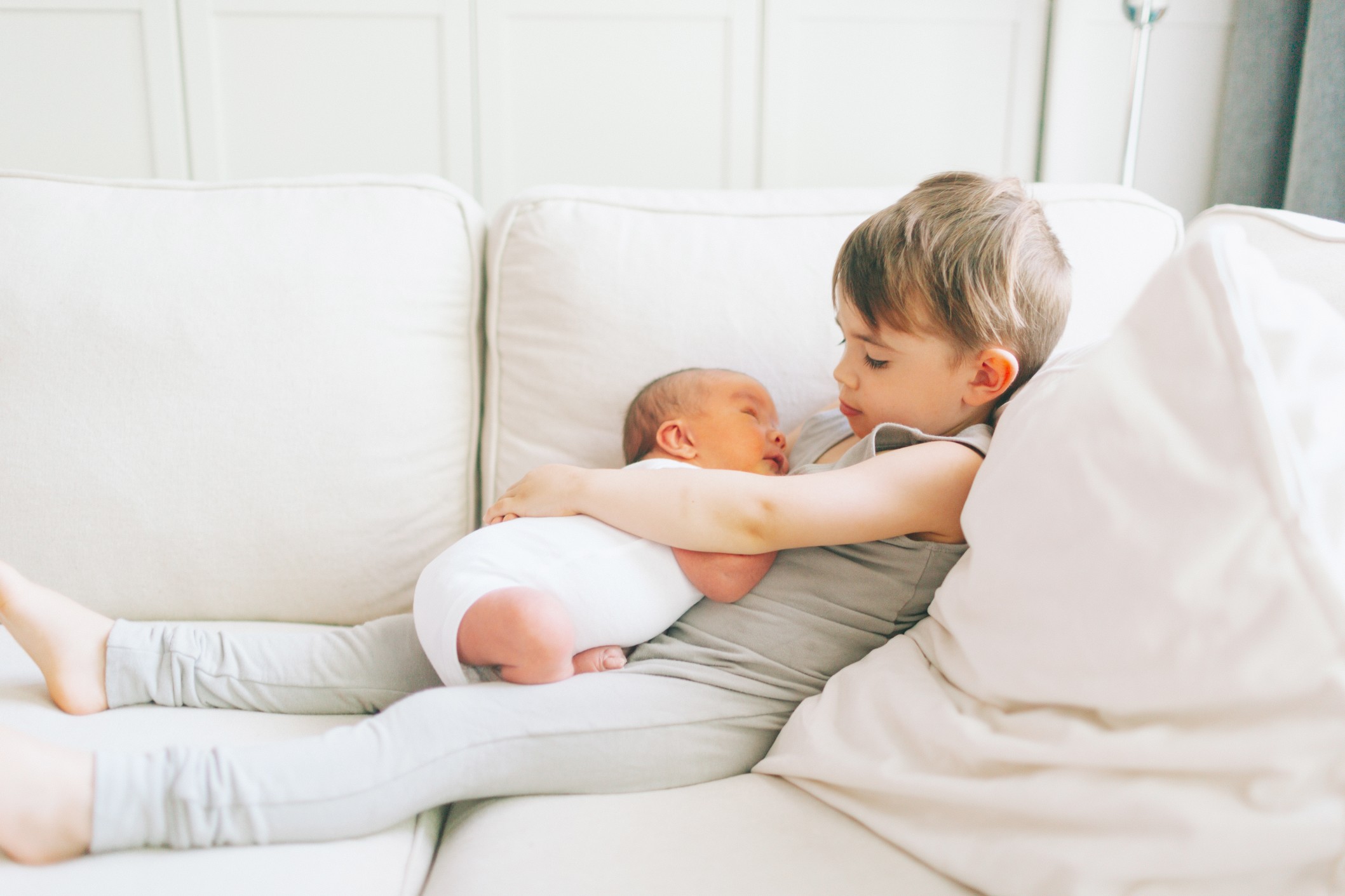 big-brother-holding-baby