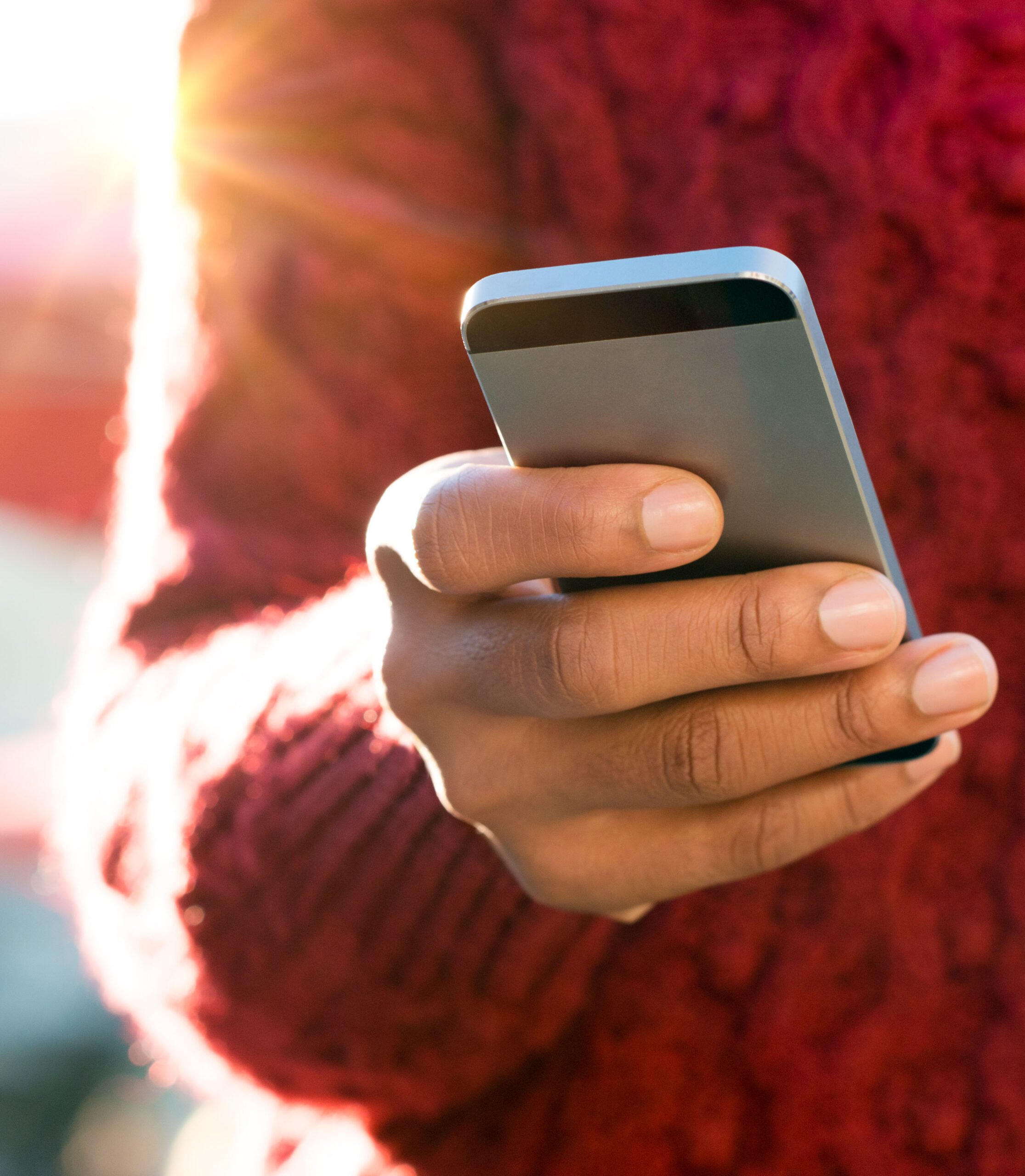 Hand typing on phone