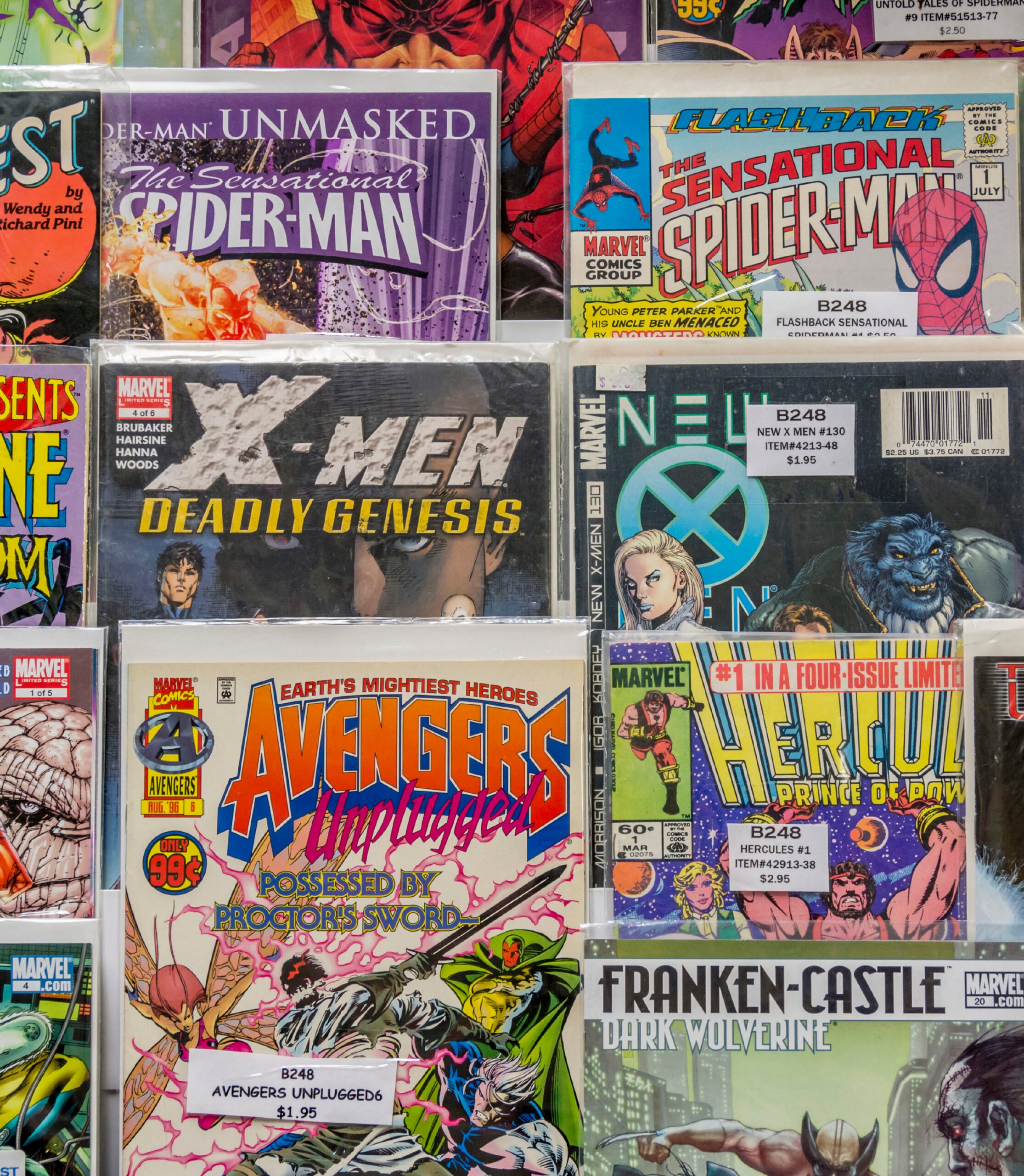 Rack of comic books for sale at a flea market