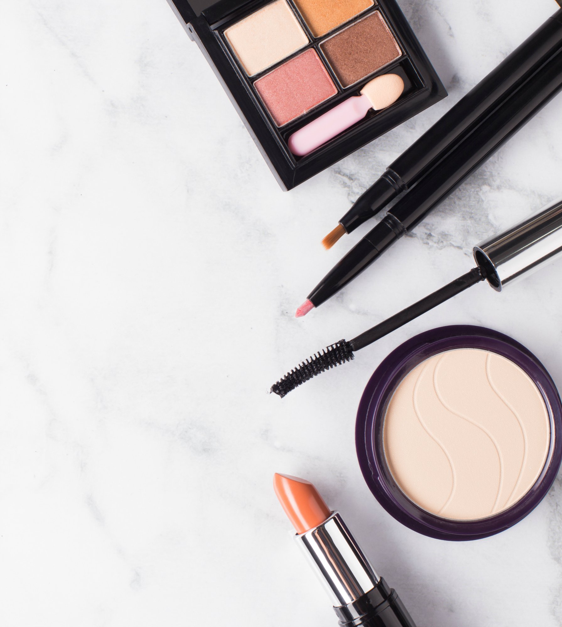 Cosmetic on marble table with copy space.