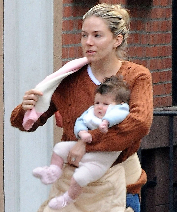Sienna Miller and daughter Marlowe are spotted out and about together in New York City as they leave a cafe after grabbing a bite to eat