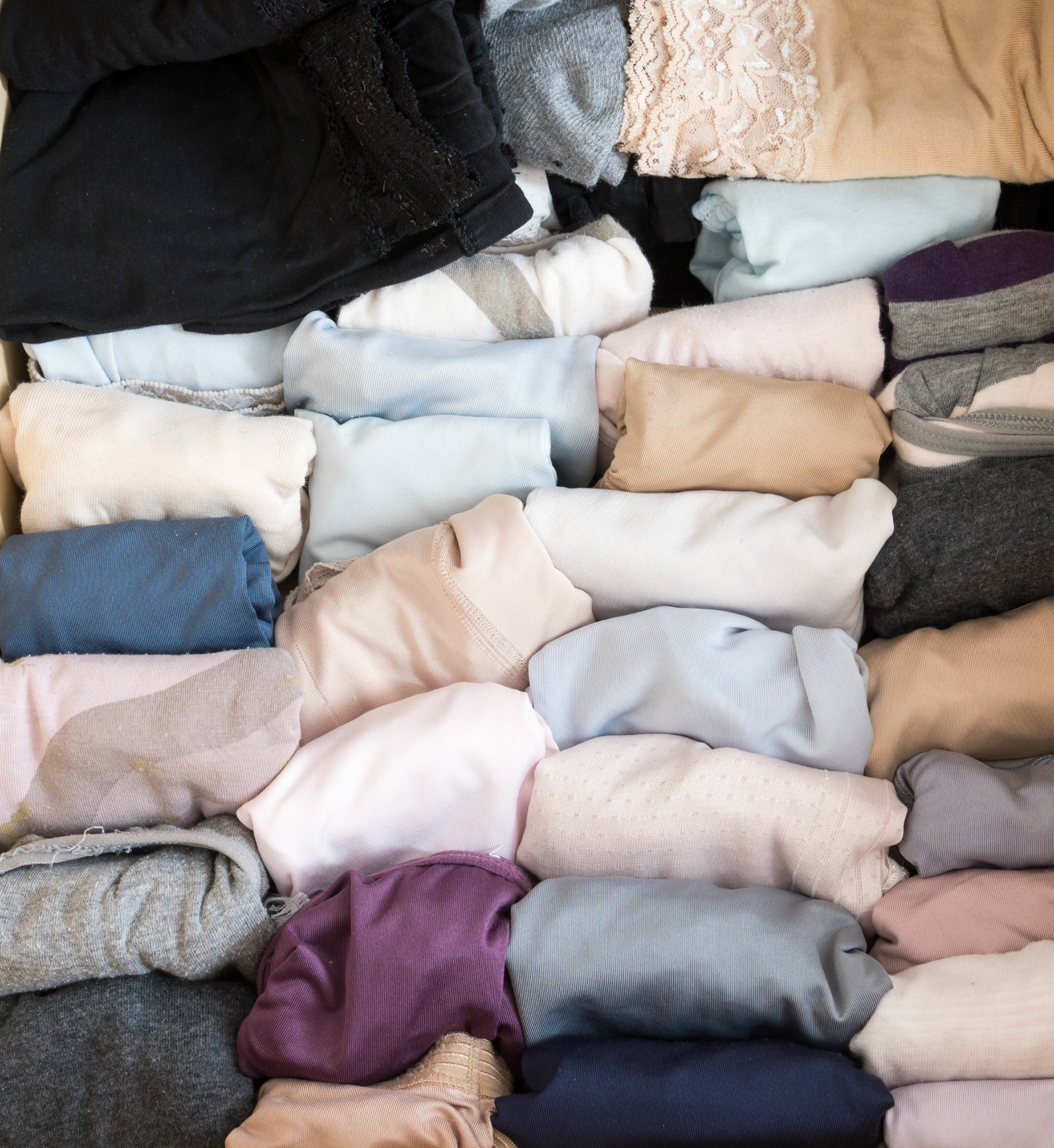 Variety of adult panties in the  wooden drawer.