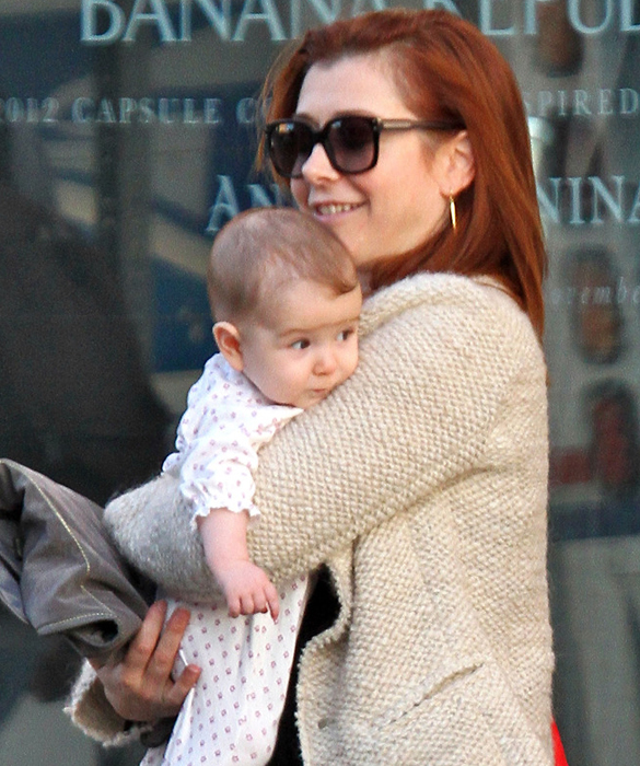 Alyson Hannigan and husband Alexis Denisof look to be having some car problems while out shopping in Santa Monica with their new daughter Keeva