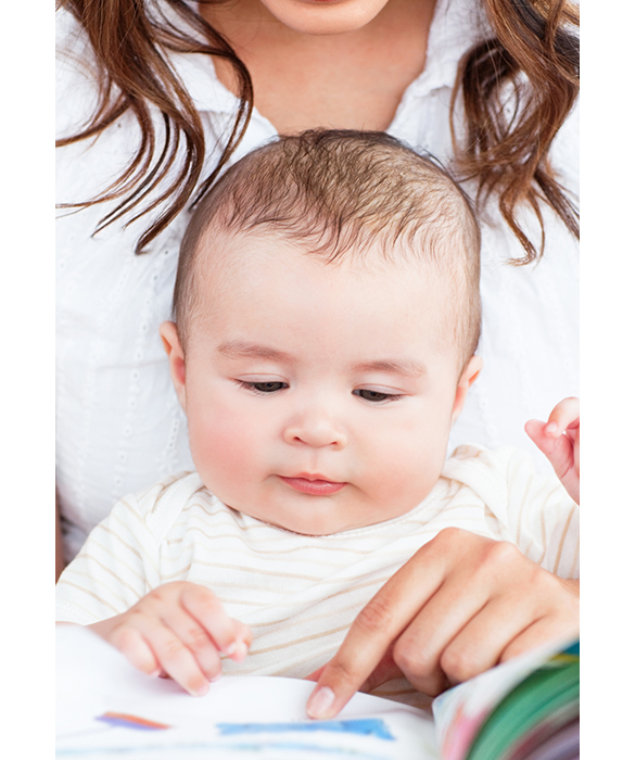 52317-latina-mom-reading-baby-6.jpg