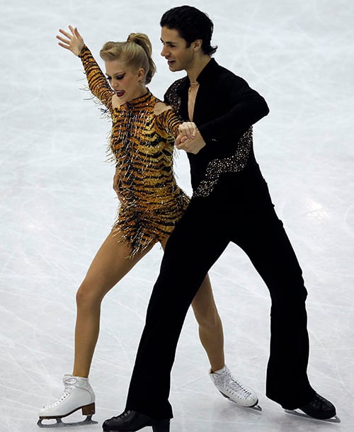 Weaver and Poje of Canada perform during the ice dance short dance at the ISU World Figure Skating Championships in Nice