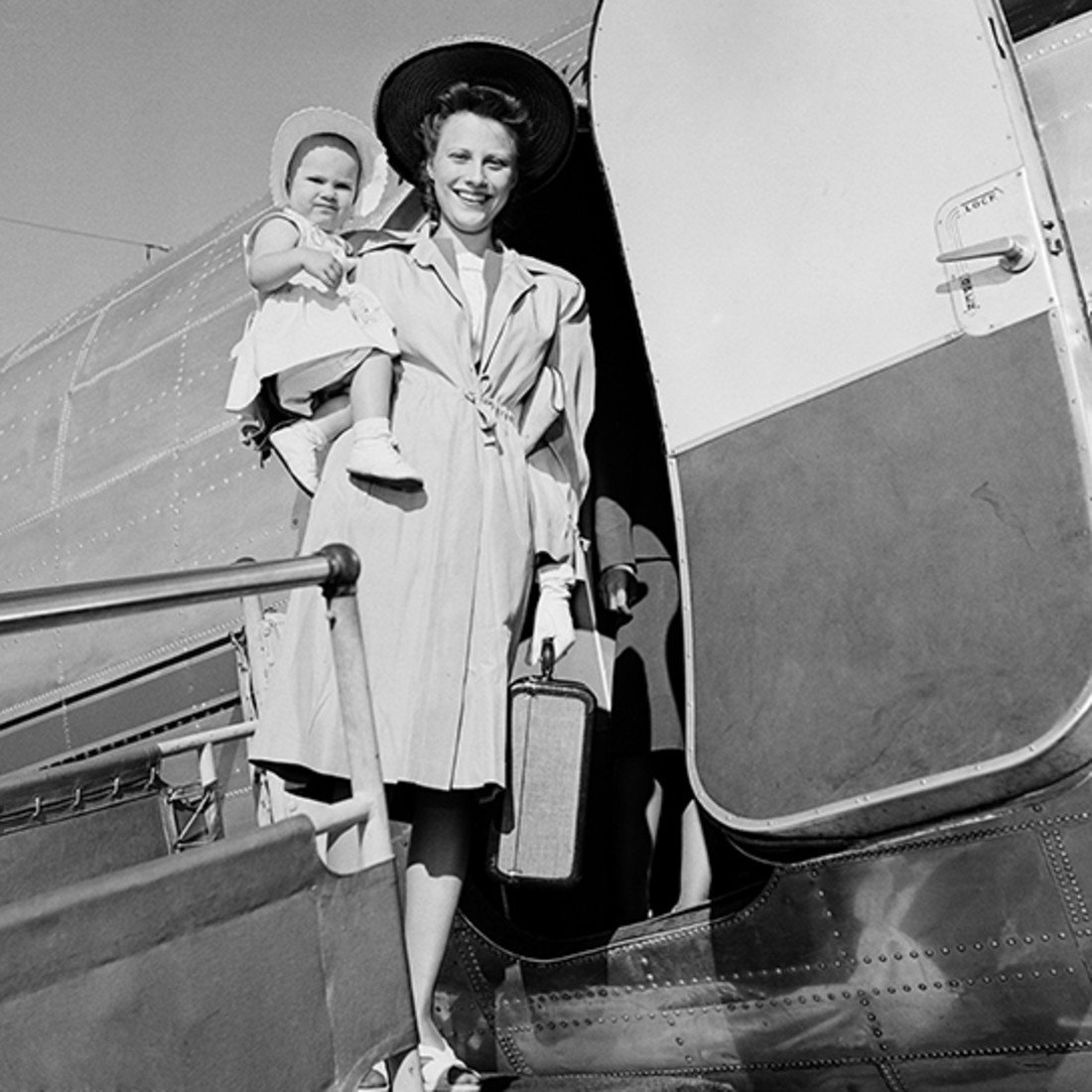 74982-1-vintage-woman-plane.jpg