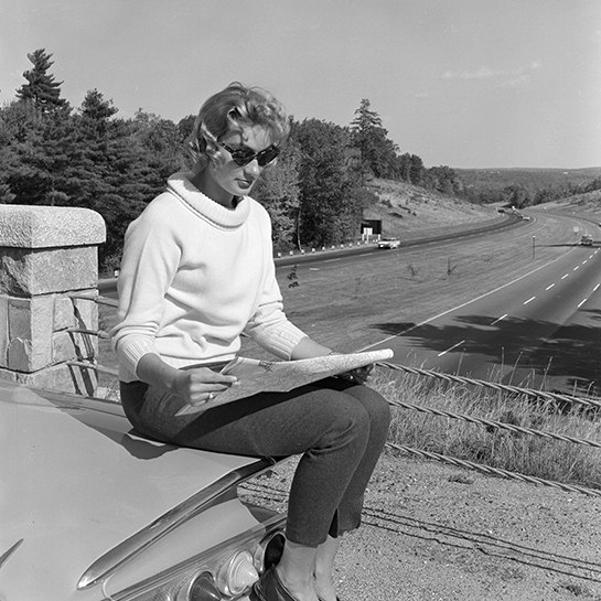74984-4-vintage-woman-on-car.jpg