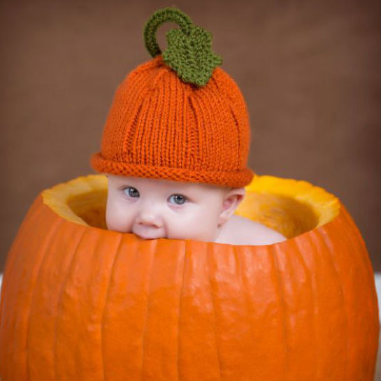 79280-baby-in-pumpkin-eating.jpg