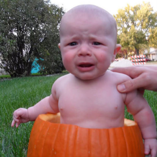 79284-baby-in-pumpkin-sad.jpg