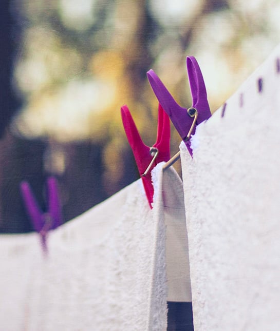 80326-10-laundry-tips-outside-drying-hanging-clothes-line-overca.jpg
