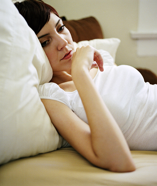 81577-2-thoughtful-woman-daylight-bed-peaceful.jpg