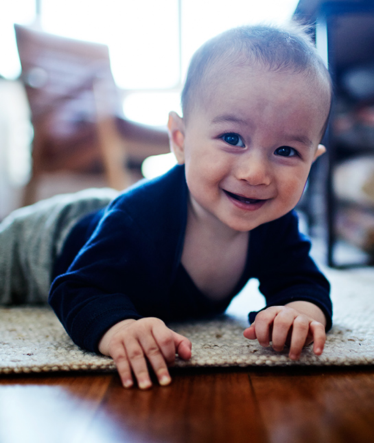 81579-4-baby-toddler-smile-floor-sunshine.jpg