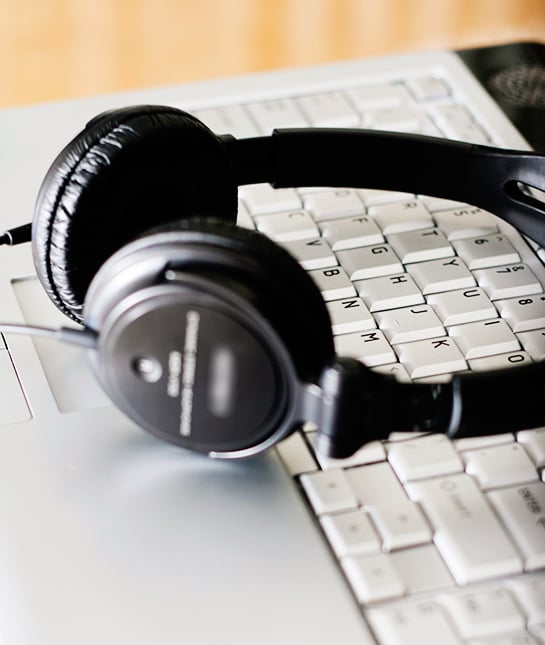82405-9-holiday-playlist-laptop-headphones-festive-music.jpg