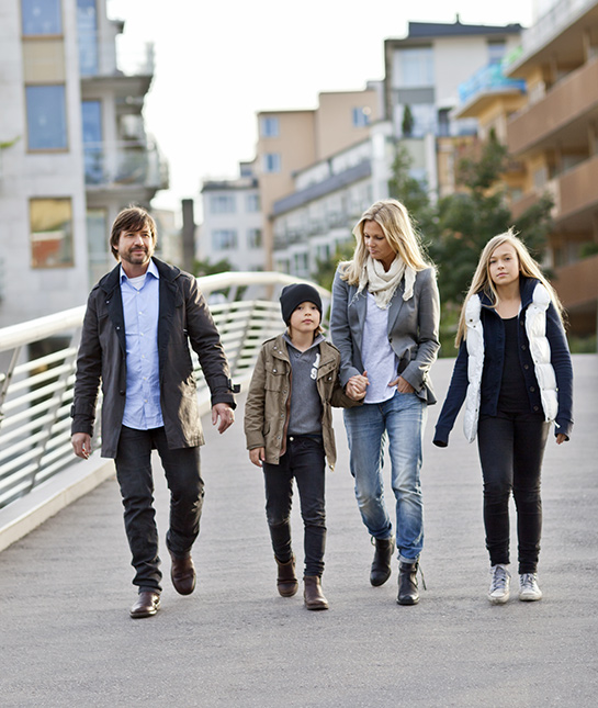82796-4-family-walks-bonding-neighborhood.jpg