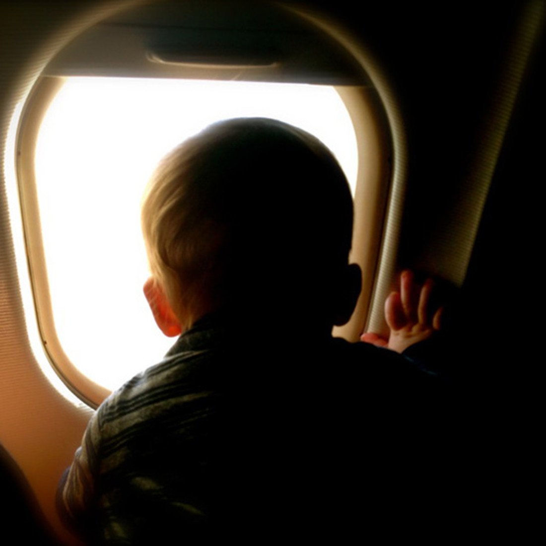 99229-4-baby-in-plane.jpg