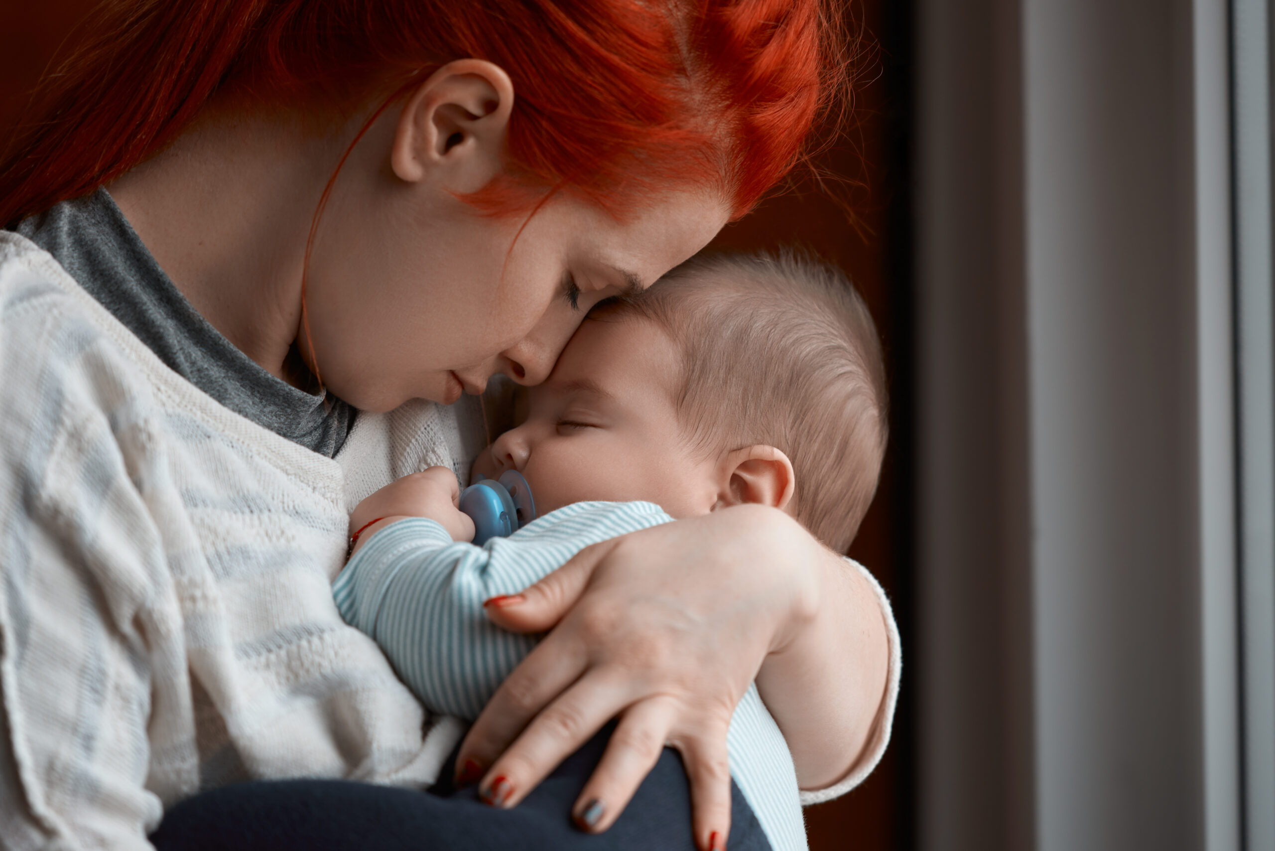 Mom holding newborn