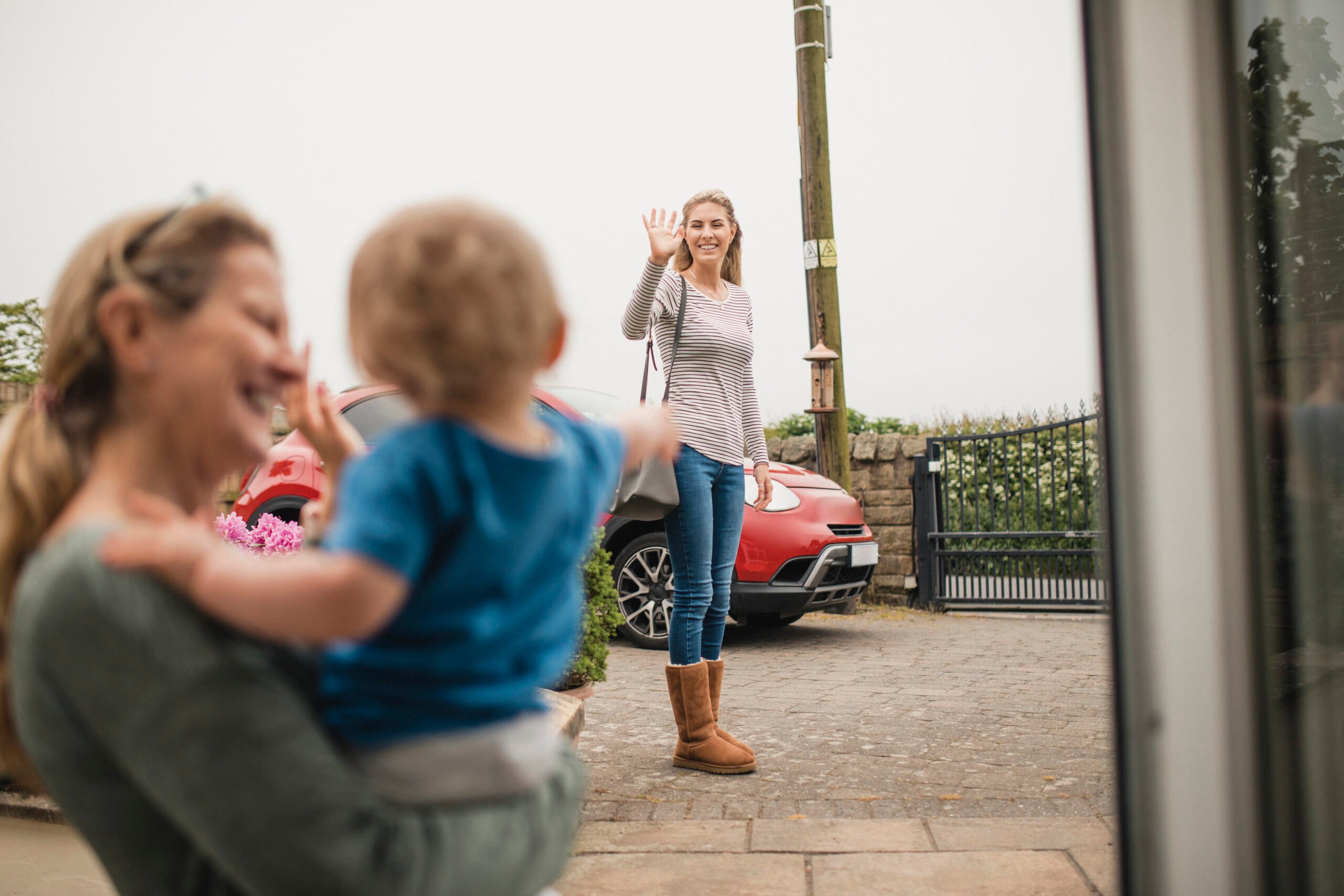 Mom waving goodbye