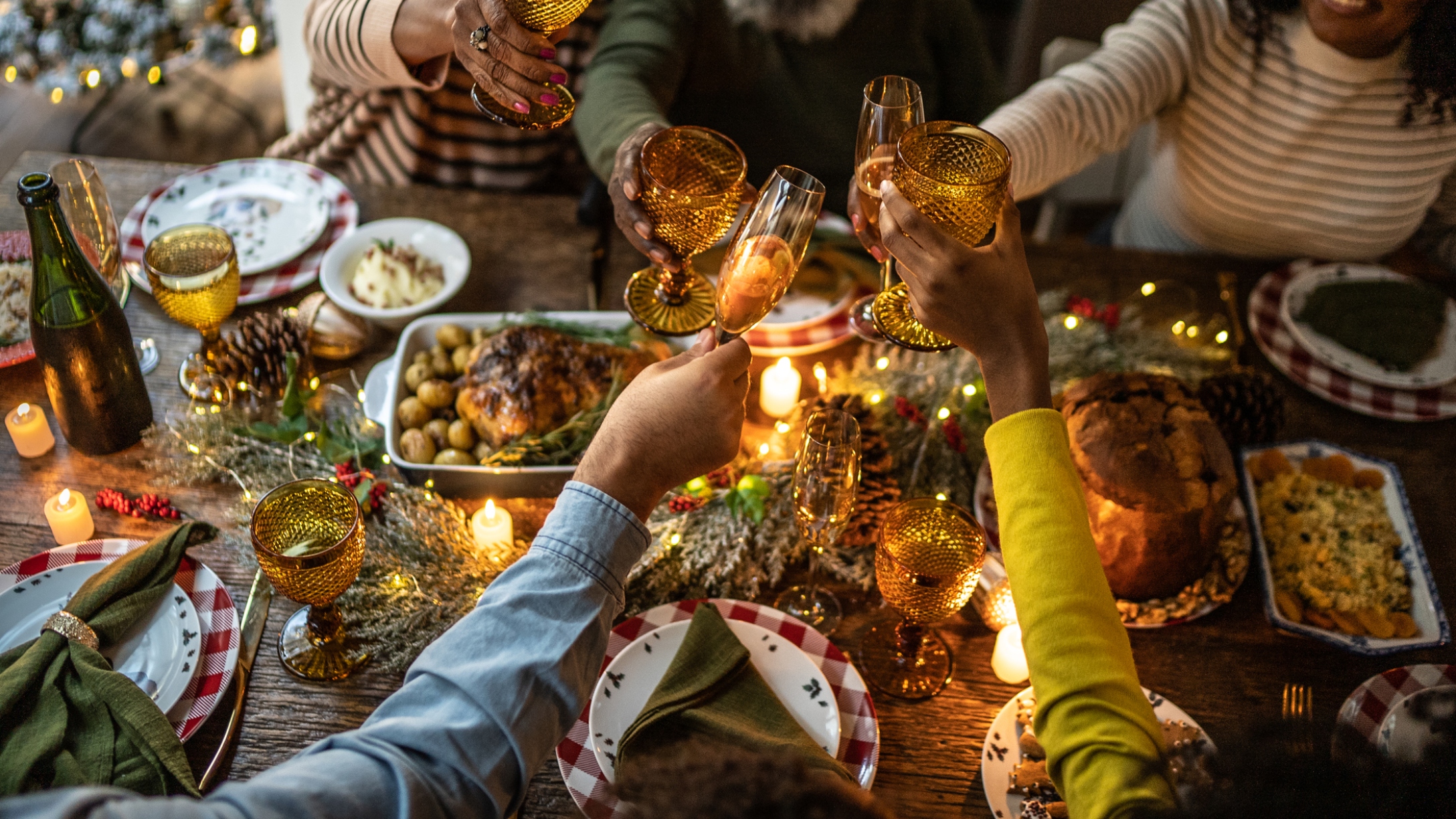 Family gathers around holiday table