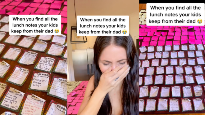 A woman looking at sticky notes