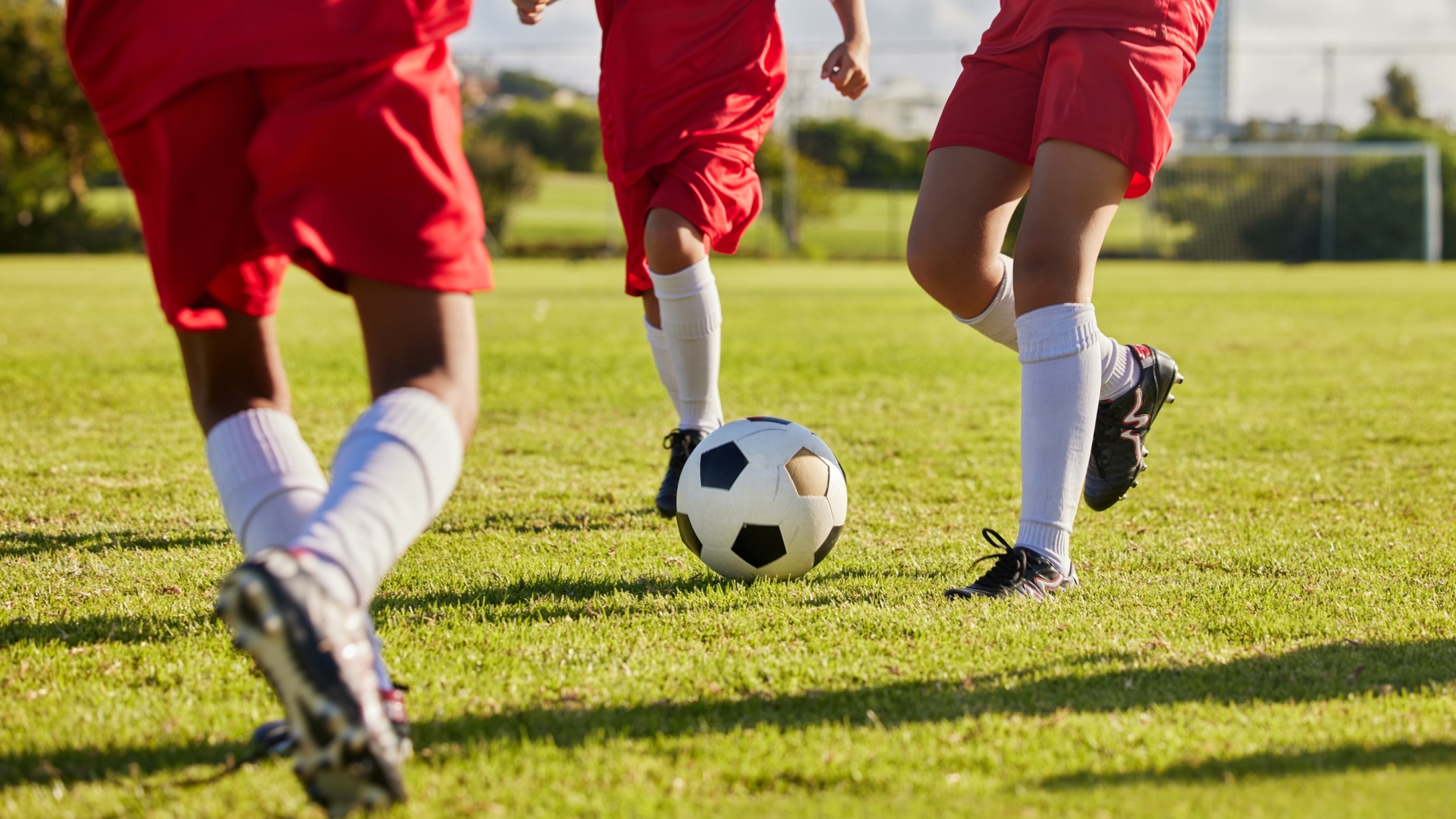 Kids playing youth soccer