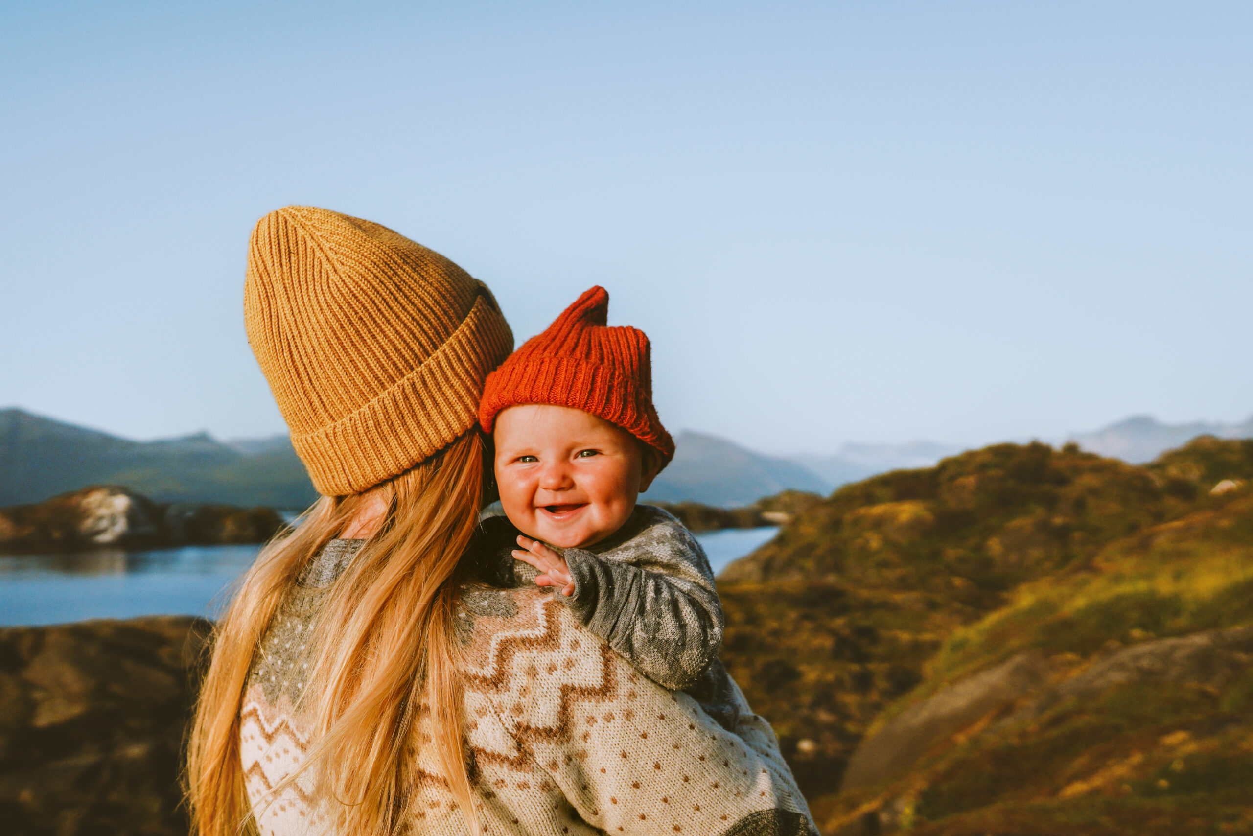Cute baby and mother walking outdoor travel family vacations lifestyle mom and smiling child together Mothers day holiday