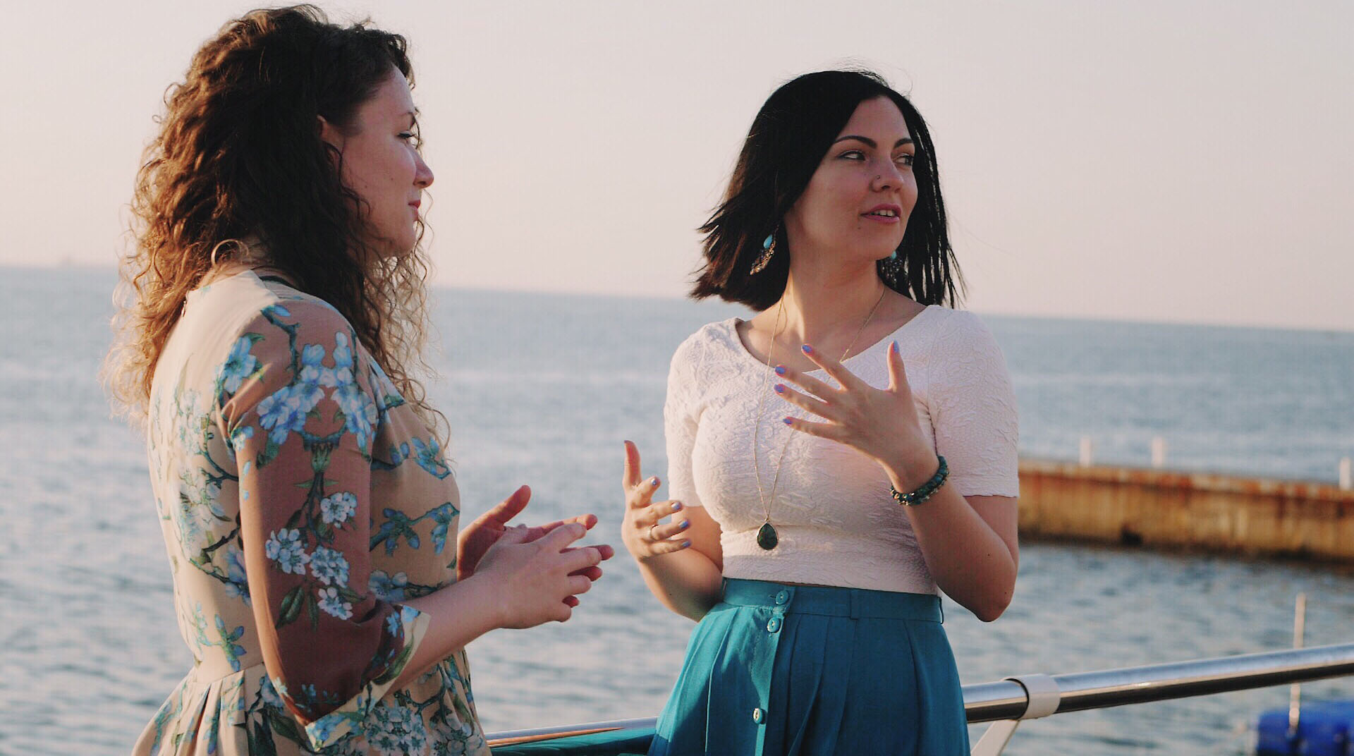 beautiful-young-attractive-women-talking-and-smiling-girls-communicating-with-each-other-and-near-or_t20_QaW18G.jpg