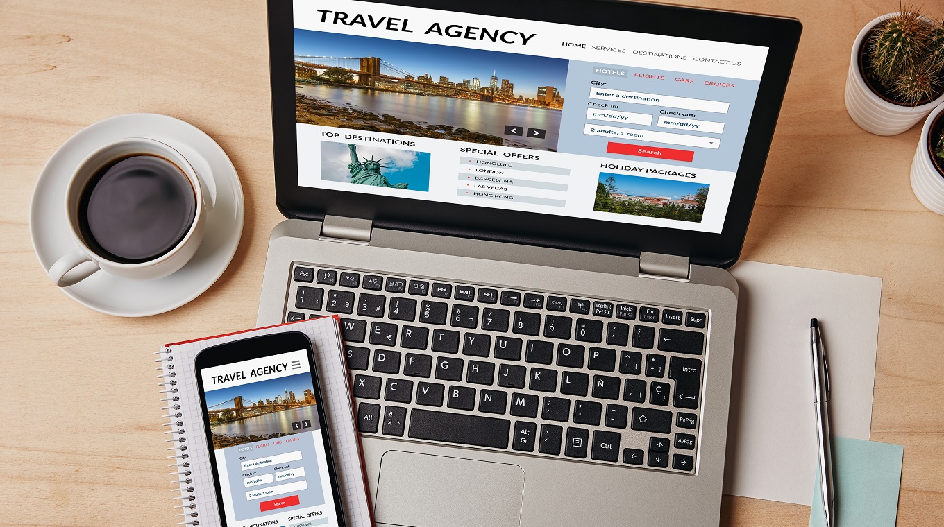Travel agency concept on laptop and smartphone screen