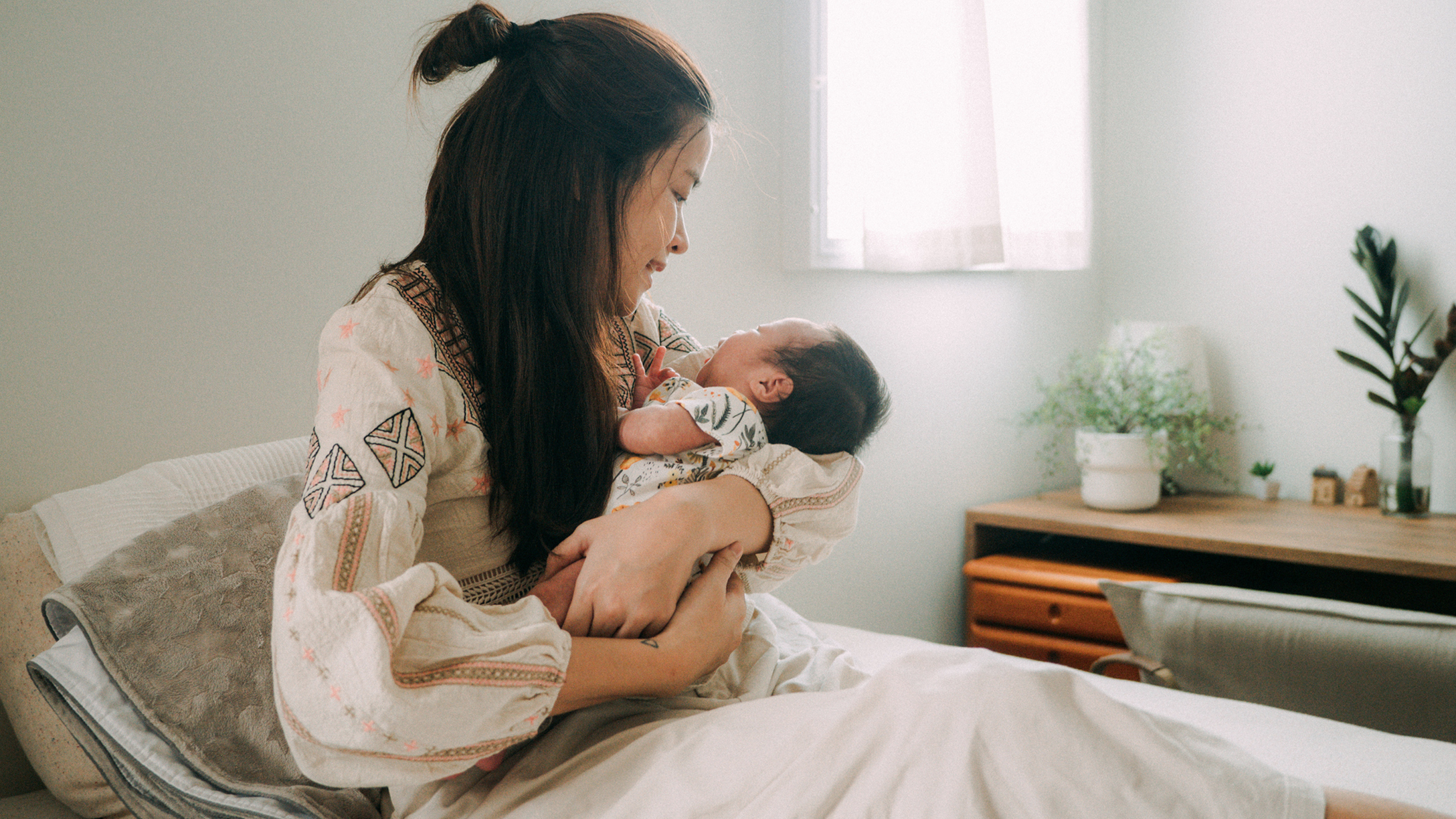 how to hold a newborn baby