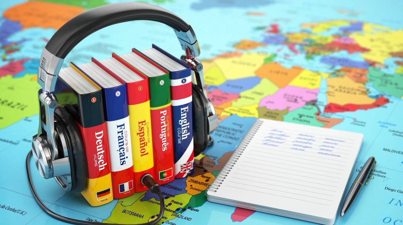 Learning languages online. Audiobooks concept. Books and headpho