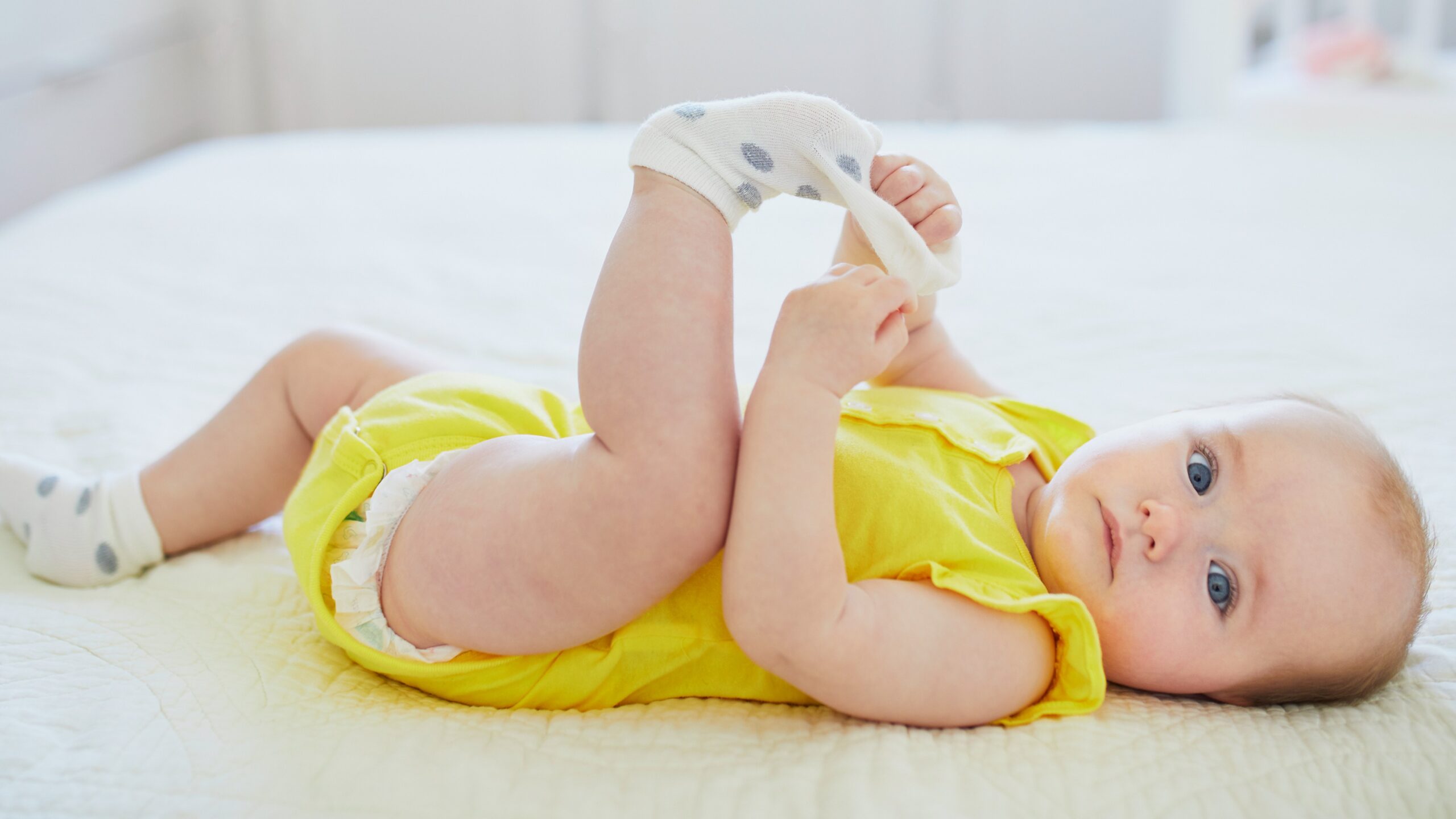 baby wearing yellow