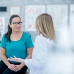 Doctor talking to patient