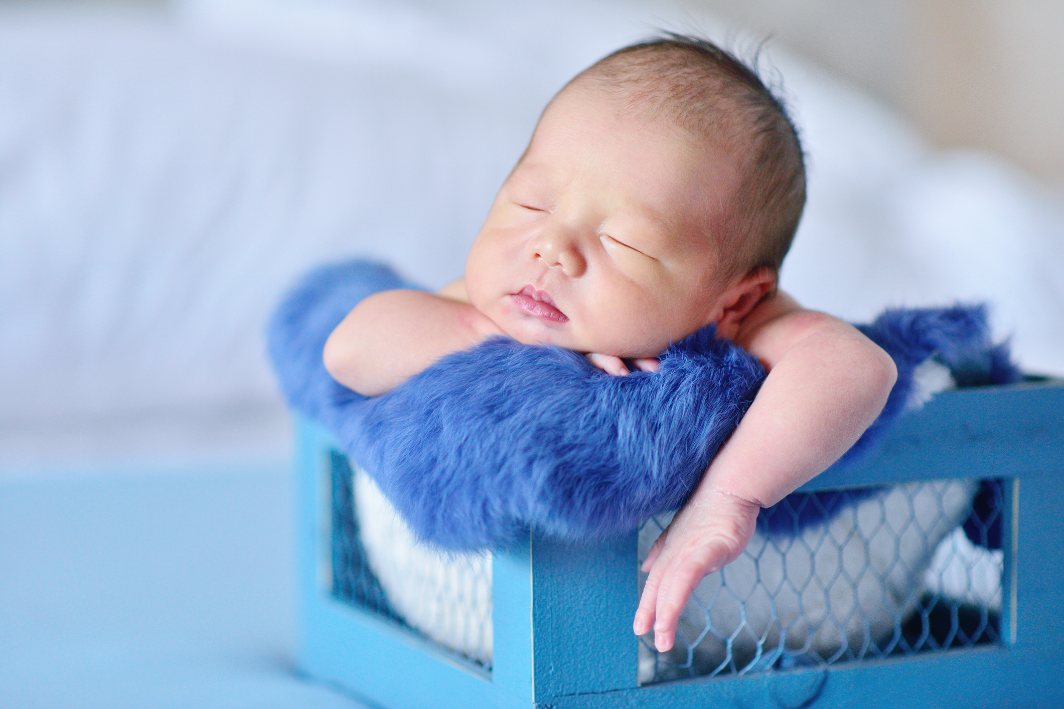 Newborn at Blue Background