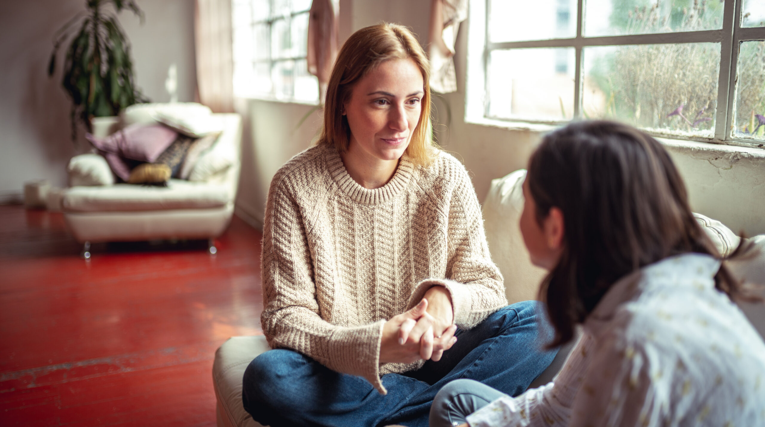 Mother and daughter having a talk.