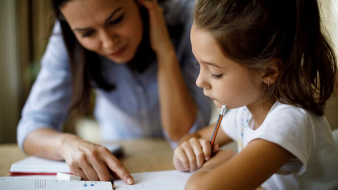 mom-helping-daughter-with-schoolwork